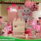 Decoração infantil tema Gatinha Marie da Nick Festas, com balões rosa e branco, painel temático, mesa decorada e detalhes delicados, perfeita para festas de meninas na Zona Norte de São Paulo.